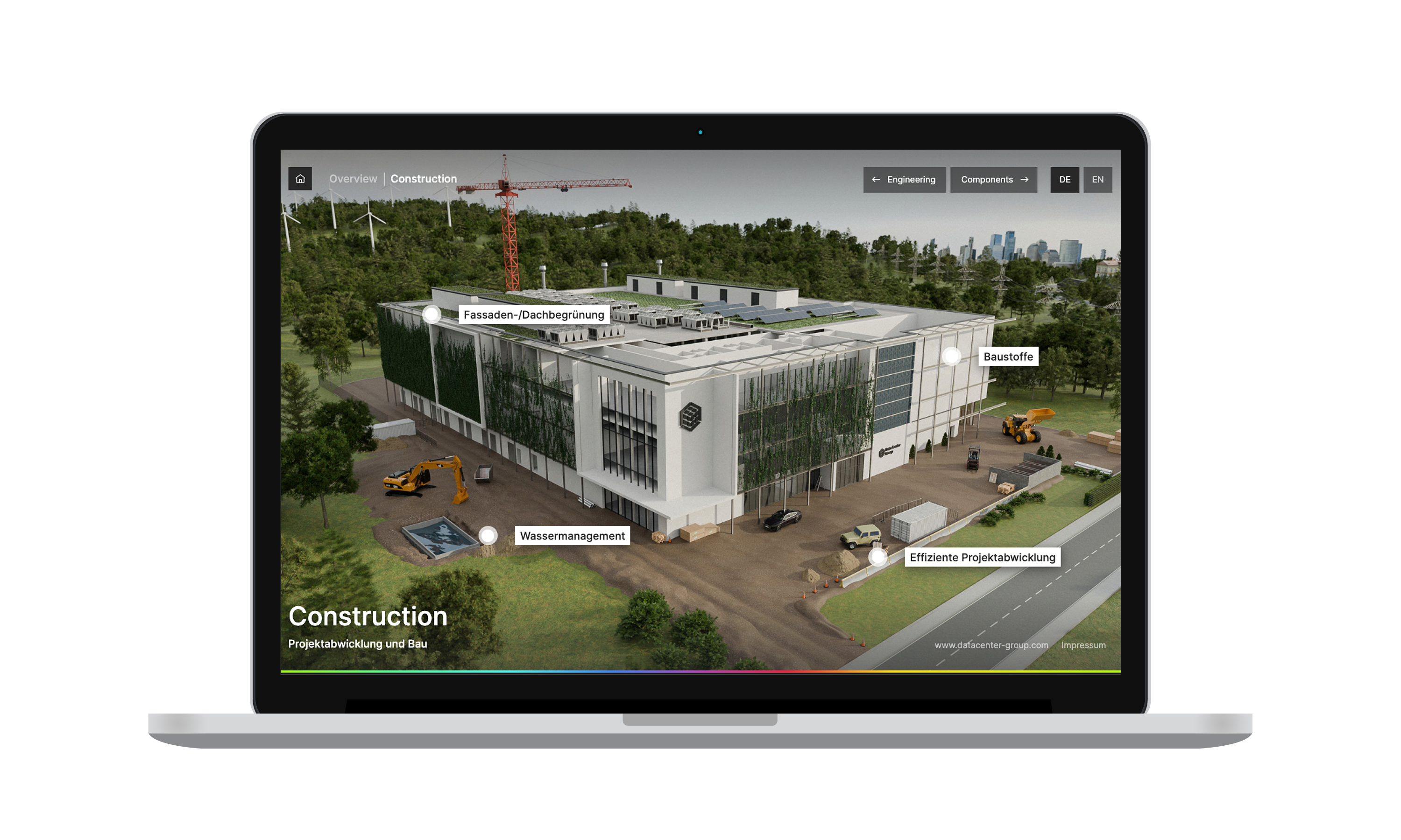 Laptop mit Bildschirm auf dem eine interaktive Anwendung zum Anklicken mit dem Bild eines Rechenzentrums zu sehen ist